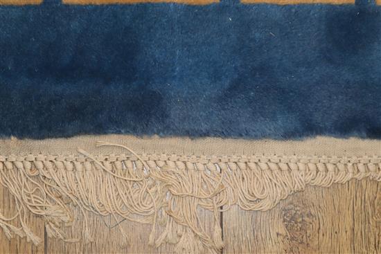 A Chinese blue ground carpet with Greek key border 480 x 365cm